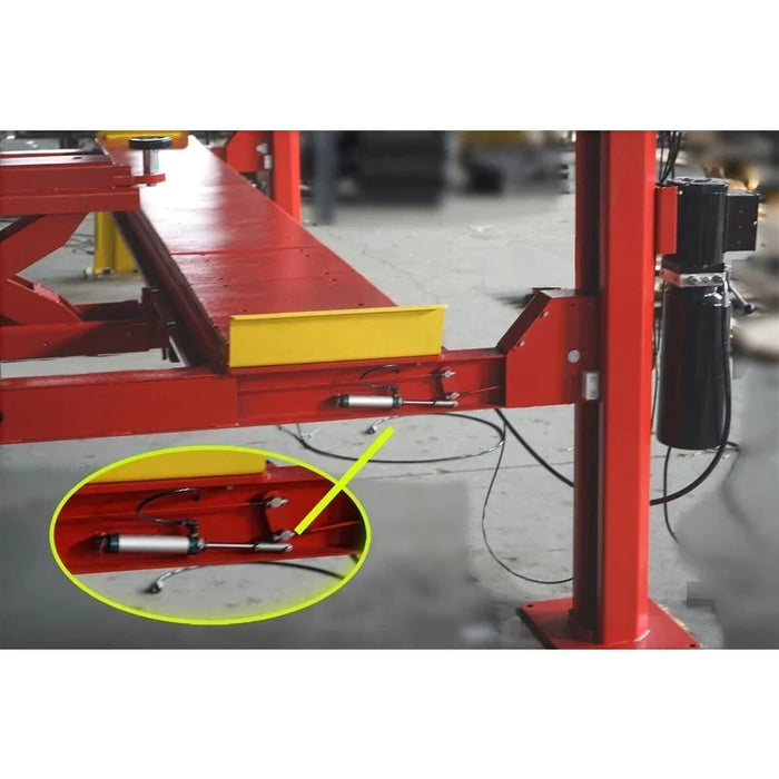 Pneumatic safety-lock release cylinder mounted in the runway crossbeam, with magnified detail inset