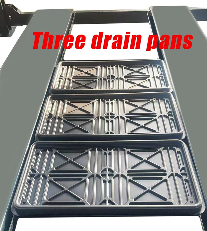 Three drip trays with X-pattern grid resting across the lift runways