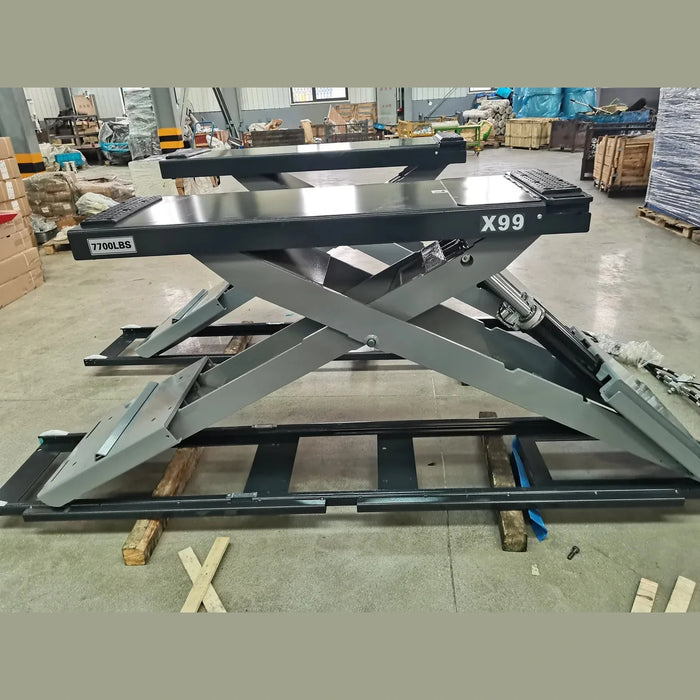 Katool KT-X99 full-rise scissor lift raised, 7,700 lb capacity, branded X99 platform