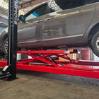 “The Bad Boy" Model: 4PXL-10B XL Portable 10,000 Lb. Lift Features Built-in Scissor Jacks, Adjustable Width Runway / 84″ Storage Space / 125″ Between Posts / 229″ Platform Length / 10-Year Warranty / SHIPS FREE! (regular price is $10,616))
