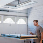 https://cdn.shopify.com/s/files/1/0771/5550/0318/files/Auxx-Lift-Attic-Lift-With-Man.jpg?v=1741302629