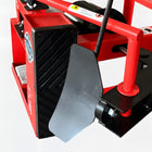 Bead breaker blade and rubber pad close-up with hands-clear warning label