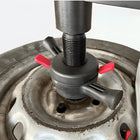 Quick-release locking collar clamping a wheel on the threaded spindle