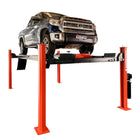 Pickup truck raised on a Katool four-post lift