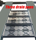 Three drip trays with X-pattern grid resting across the lift runways