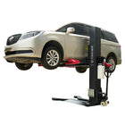 Buick MPV raised on the Katool KT-SPL700 7,000 lb single post lift for under-vehicle service.