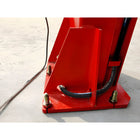Close-up of Katool Vehicle Lift base featuring sturdy design and hydraulic hose access for automotive repairs